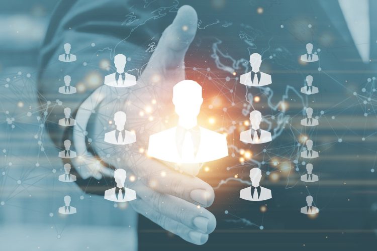 Businessman on blurred background with people connection icon and business leadership chart.